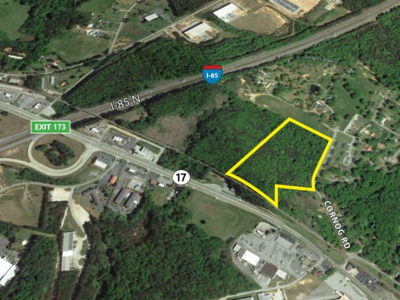A map of the area with a yellow sign on it.