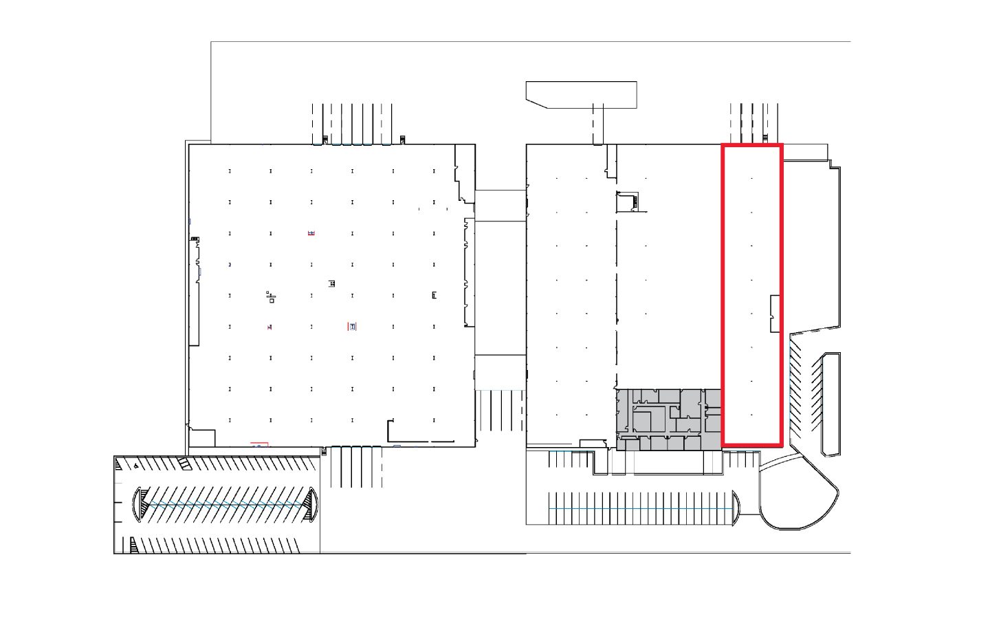 A floor plan of a building with some red lines.